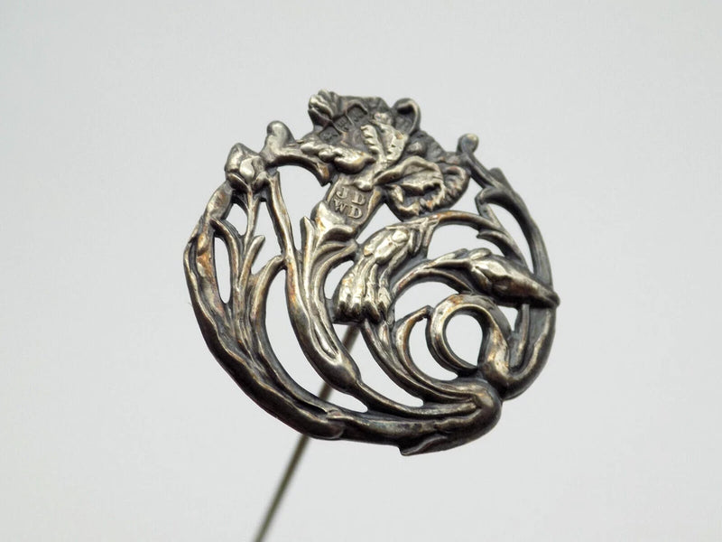Antique sterling silver carnation hat stick pin with raised floral design