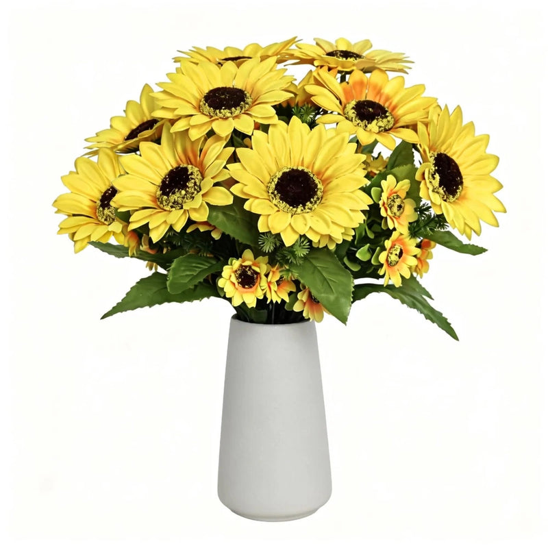 Artificial sunflower table centerpiece with yellow blooms and dark centers in white ceramic vase