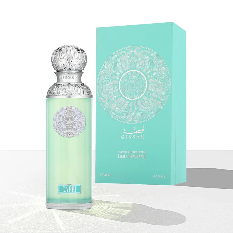 Light aqua Capri perfume spray bottle with ornate cap and Gissah gift box