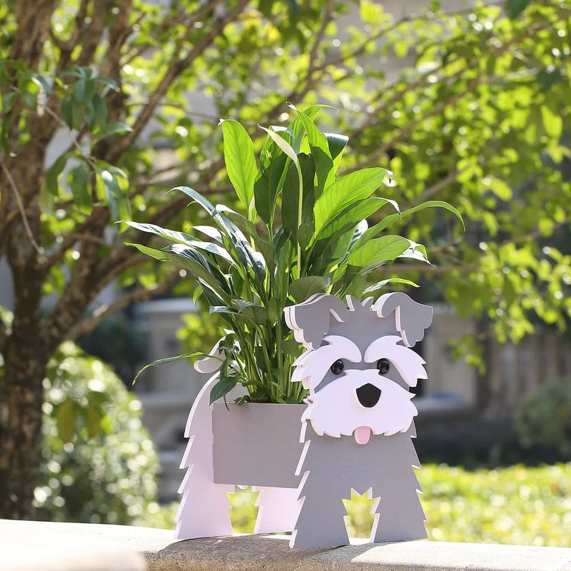 Schnauzer dog garden planter pot with gray face cutout holding green plants