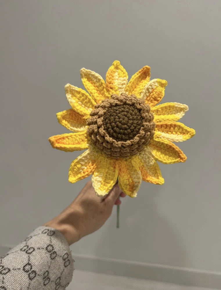 Crochet sunflower amigurumi home decor with yellow petals and brown center