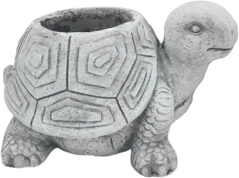 Gray turtle-shaped planter with textured shell design and round bowl