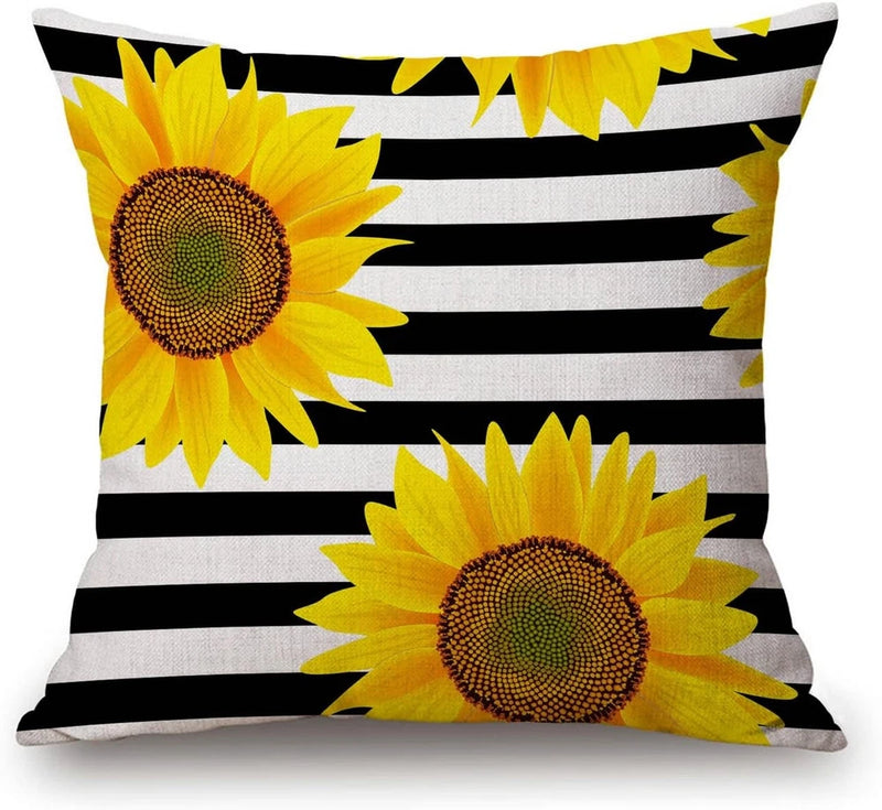 Sunflower decorative pillow cover with yellow blooms on black-and-white stripes