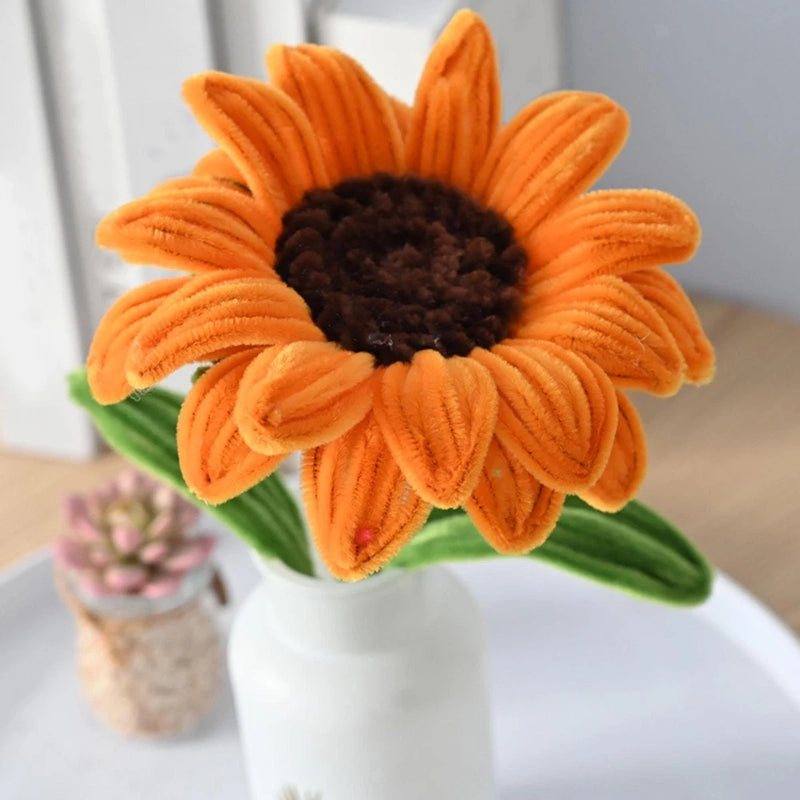 Artificial orange sunflower with dark brown center and green leaves, single stem bouquet