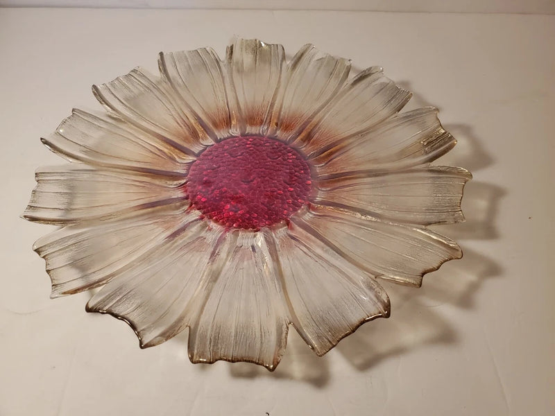 Glass sunflower platter with red center and petal-like clear rim, 11-inch