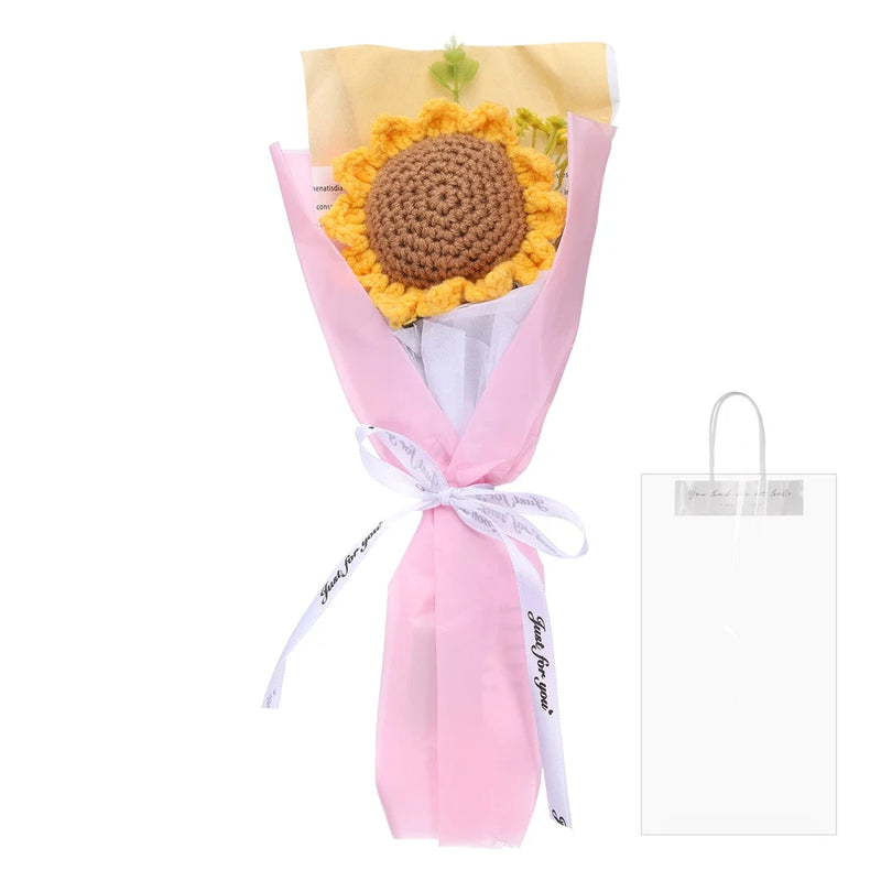 Handmade crochet sunflower bouquet with brown center, yellow petals, pink wrapped ribbon