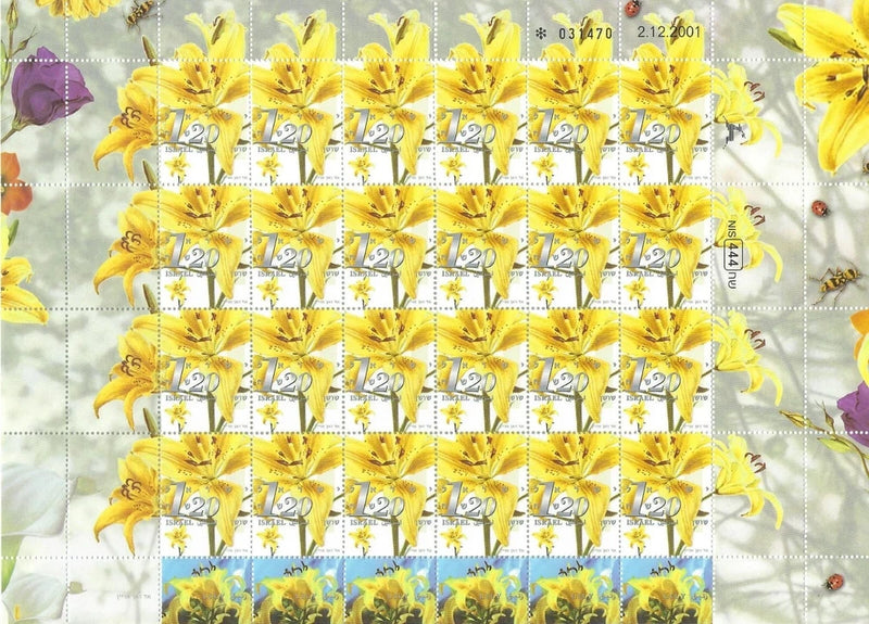 Yellow lily flower stamp sheet with multiple stamps, perforated edges, postmark marks