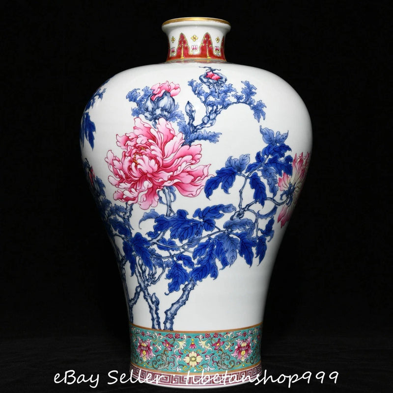 Porcelain peony bottle vase with blue and pink floral design, gilt rim
