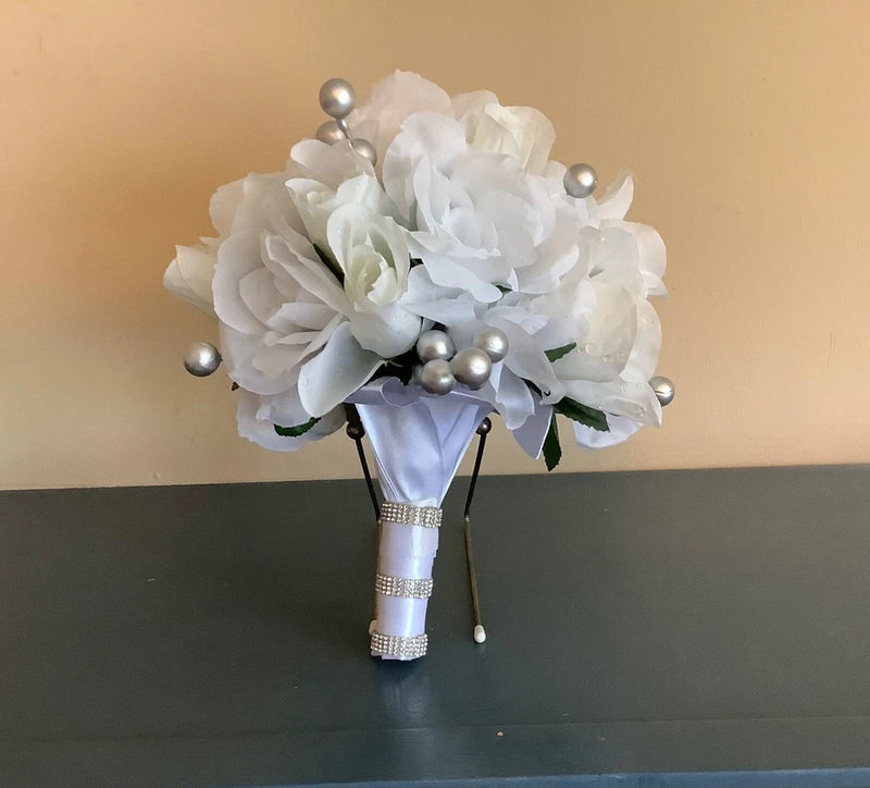 White roses, white rosebuds and silver berries bridal bouquet Bouquet
