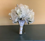 White roses, white rosebuds and silver berries bridal bouquet Bouquet