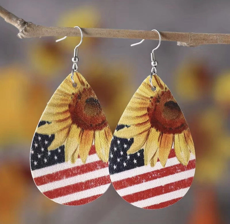 Teardrop patriotic earrings with sunflower artwork, stars and red-white stripes, dangling