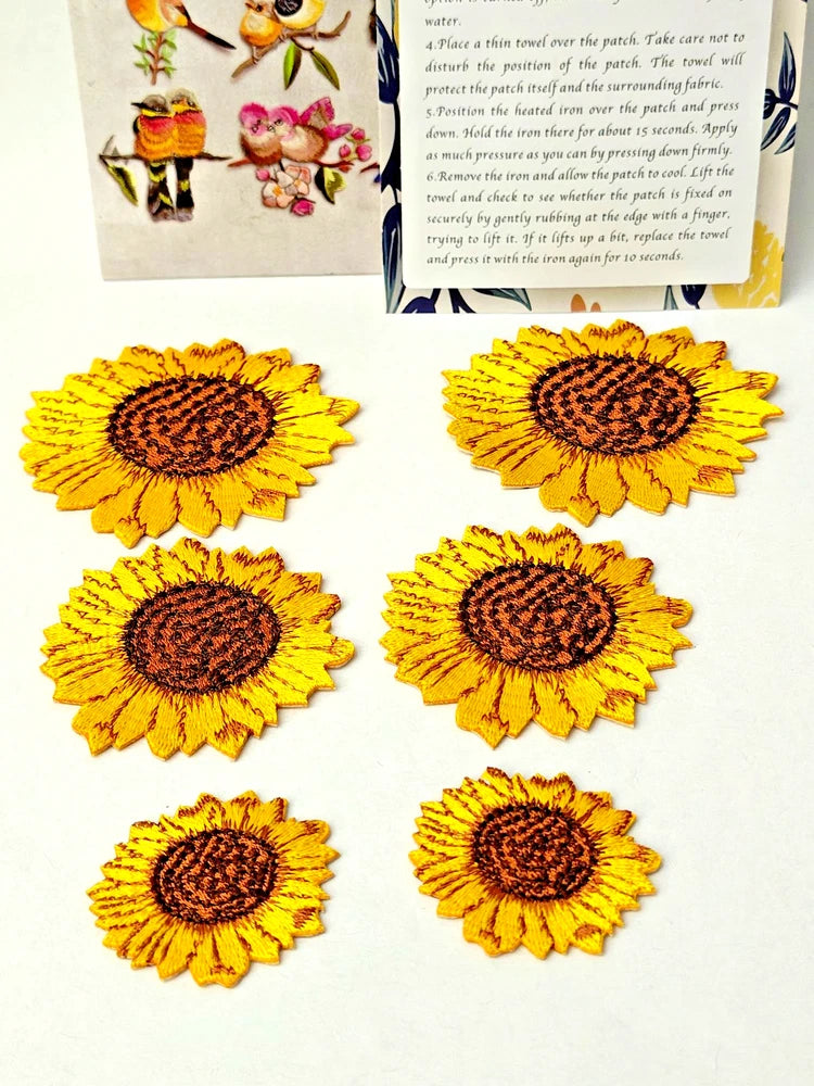 Set of six iron-on sunflower applique patches with yellow petals and dark brown centers