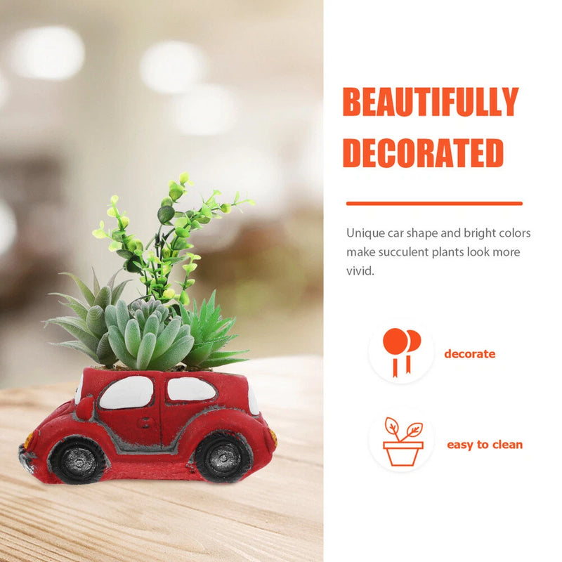Red car-shaped planter with green succulent plants, desk garden decoration