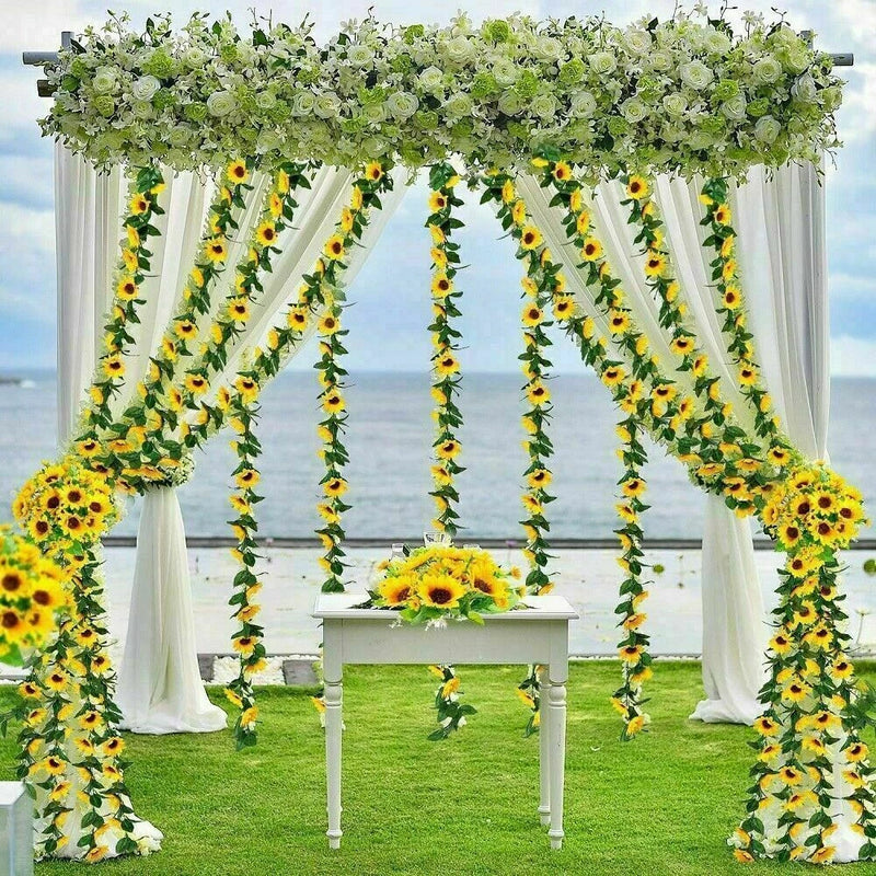Artificial sunflower ivy vine garland with yellow blooms and green leaves, draped
