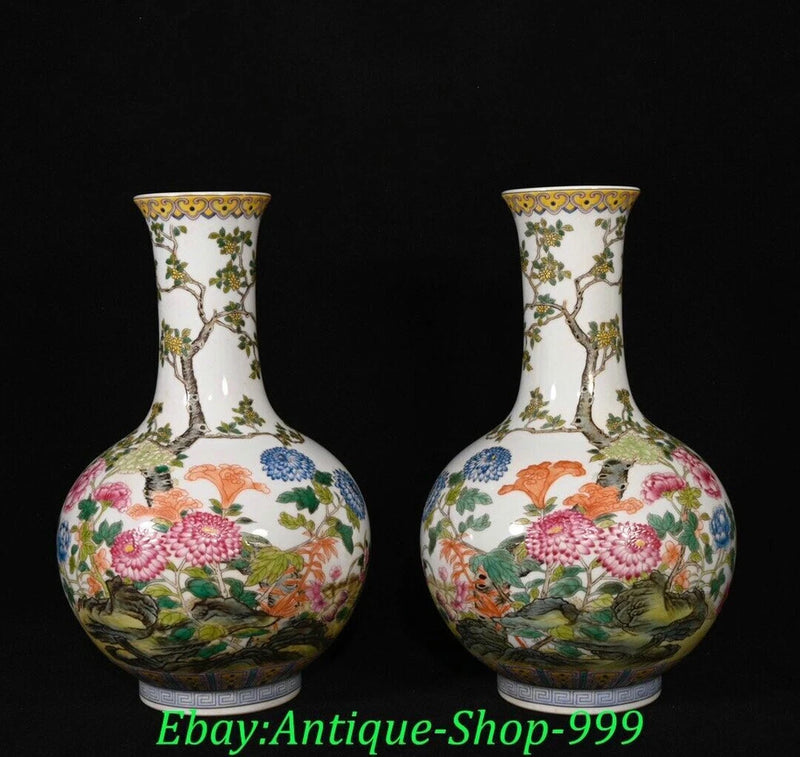Pair of white porcelain vases with painted peony and floral bird scenes