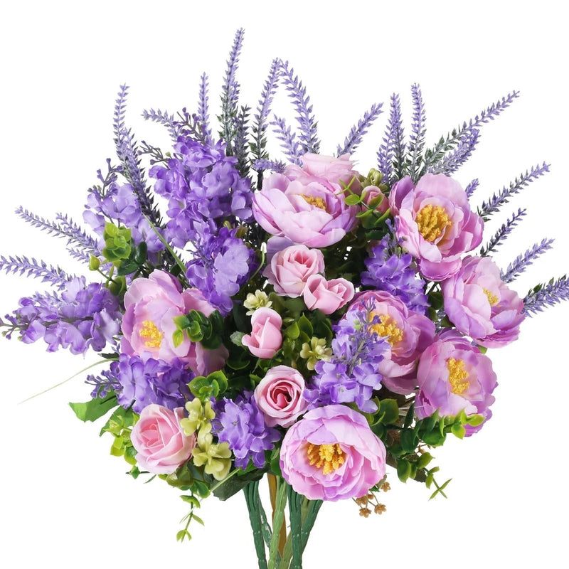Artificial flower bouquet with purple peonies, pink roses, and lavender sprigs with green leaves