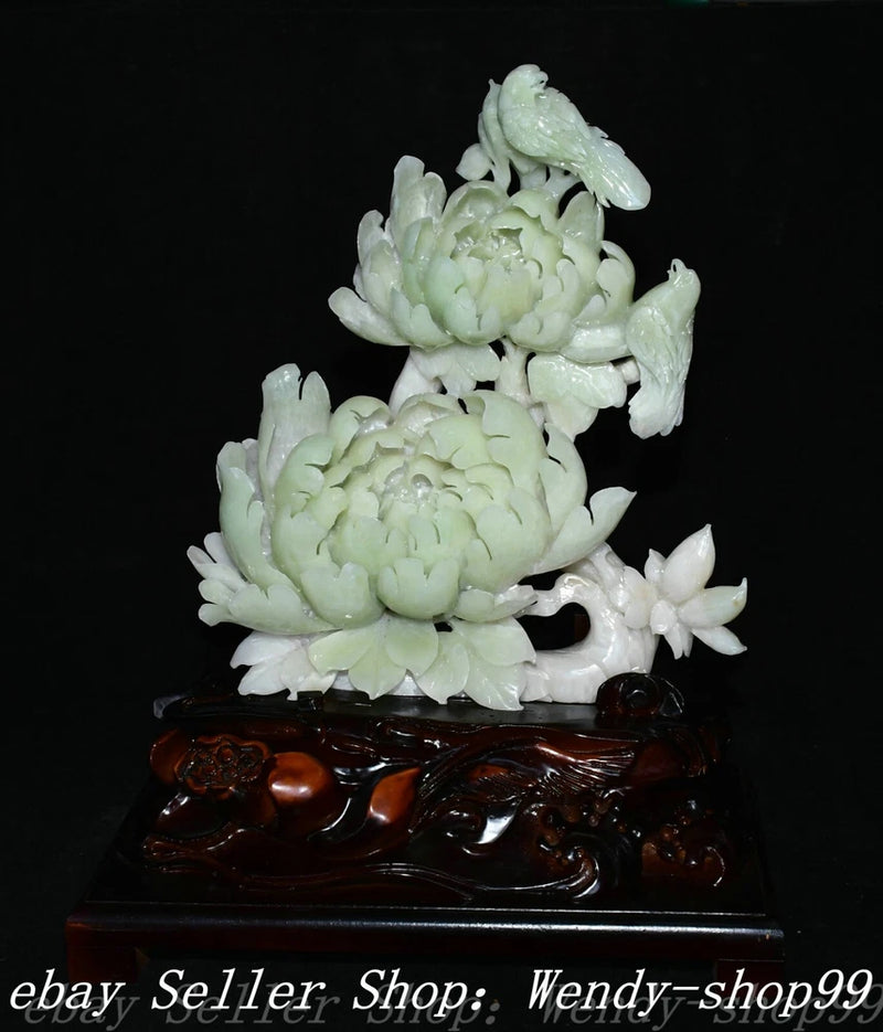 Pale green jade bird and peony flower carving statue on dark wood base