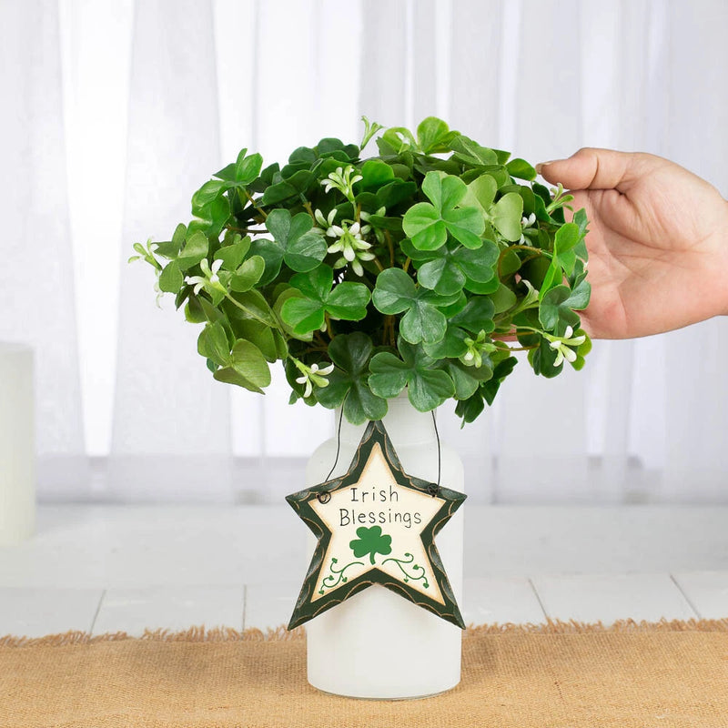 Artificial shamrock plant bundle with green leaves in white vase and Irish Blessings star tag