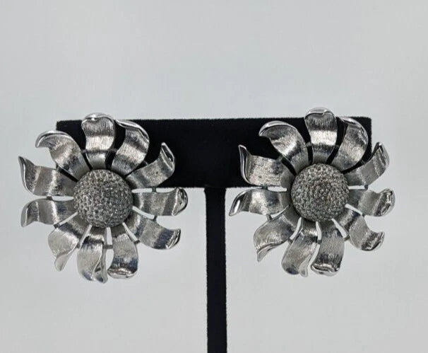 Vintage Trifari silver tone flower/sunflower clip on earrings Sunflower