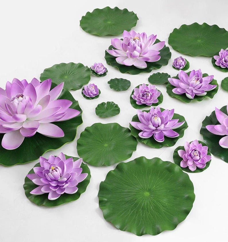 Artificial floating lotus lily pool flowers with purple blossoms and green lily pads