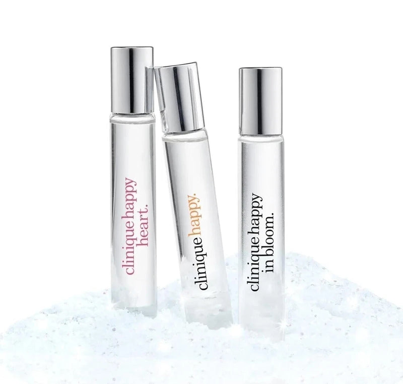 Clinique Happy Treats fragrance set with three slim bottles, silver caps