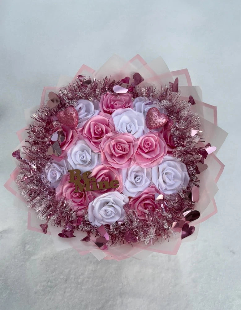 Heart-shaped pink and white rose ribbon bouquet with glitter tinsel trim