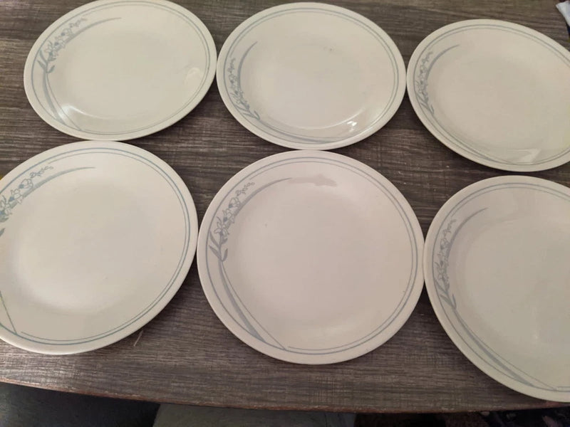 Set of 6 white dessert plates with blue floral rim detail
