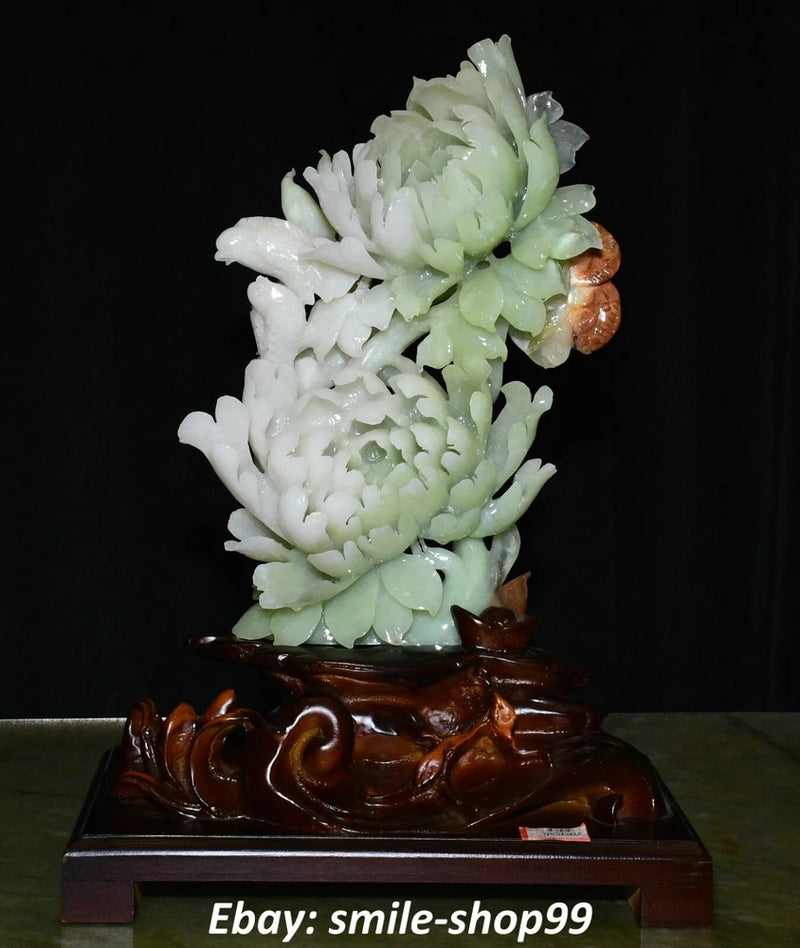 Carved peony flower and leaf decoration statue with pale green and white carvings, dark stand