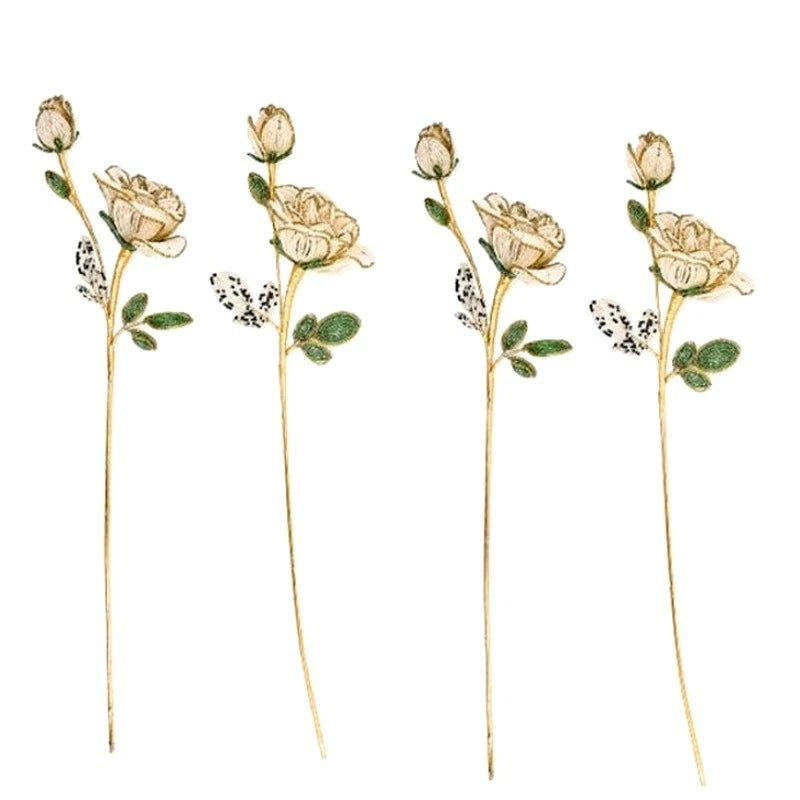Set of four white rose beaded stems with green leaves and thin gold stems