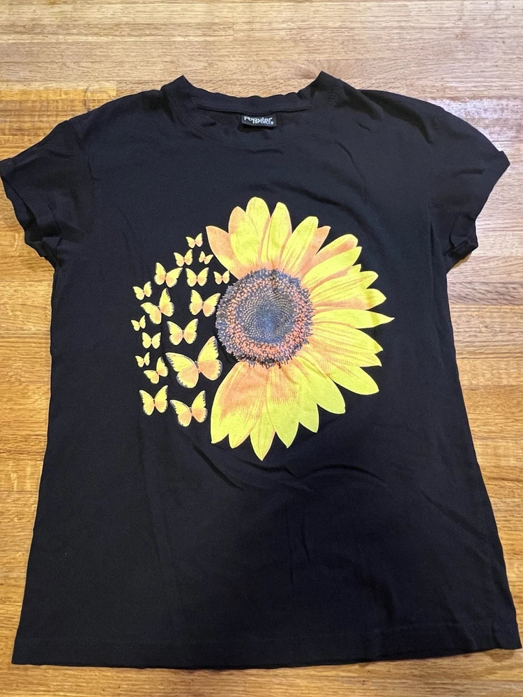 Women’s black short-sleeve T-shirt with sunflower and butterfly graphic, crew neck