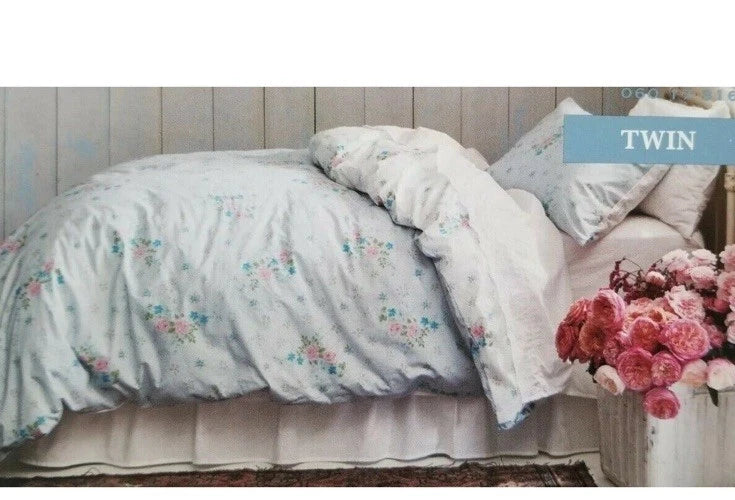 Twin duvet cover in light blue with scattered floral rose pattern.