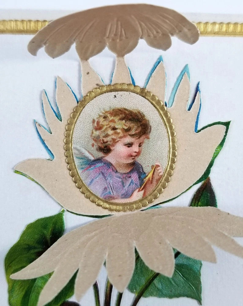 Embossed die-cut water lily New Year card with angel portrait medallion and leaves