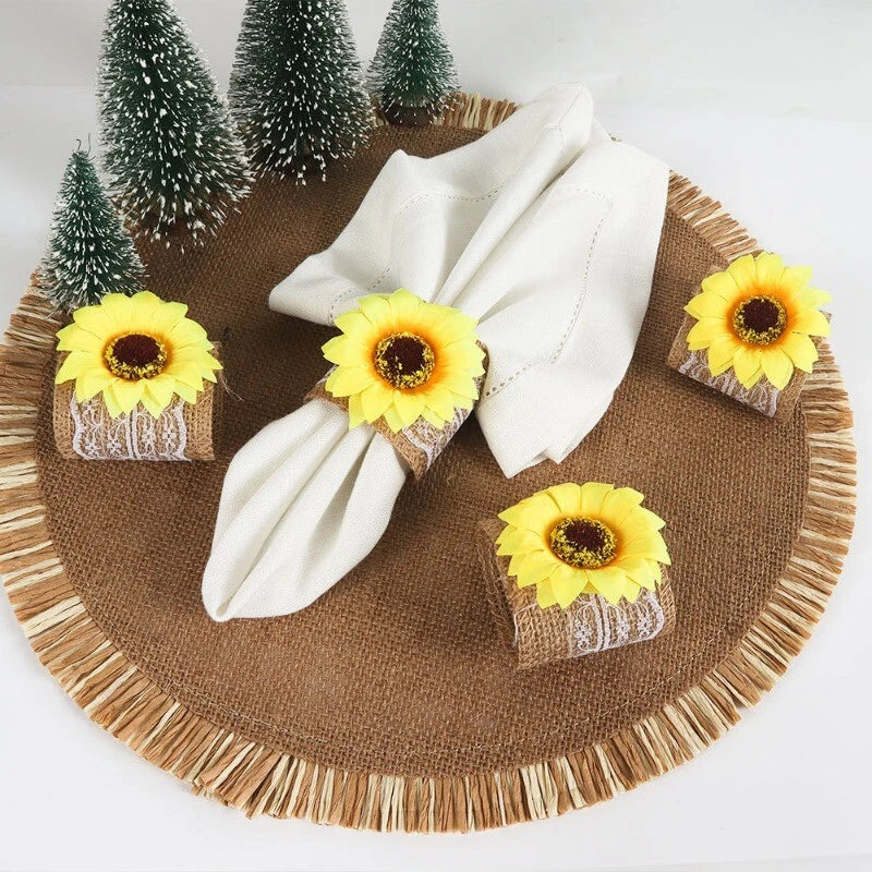 Sunflower napkin ring set with lace and fringe, yellow fabric flower accents.