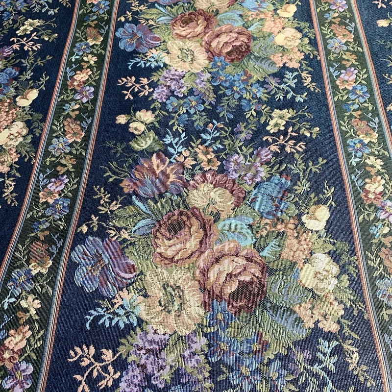 Blue floral tapestry upholstery fabric with roses and vertical striped border