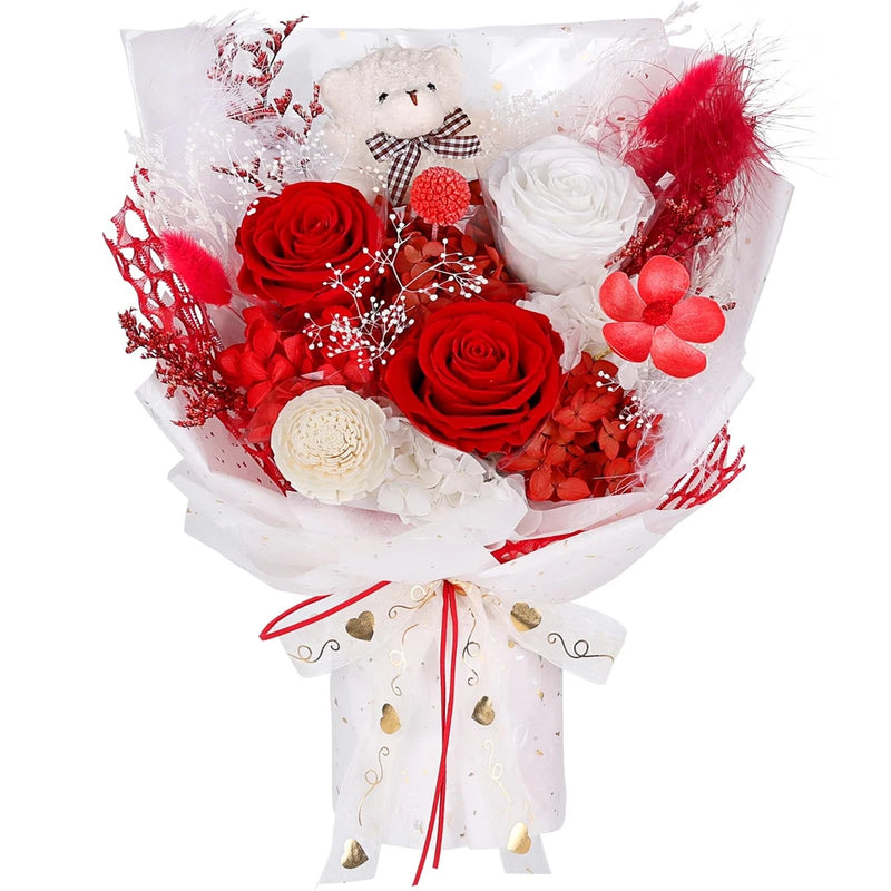 Preserved flower bouquet with red and white roses, plush bear, gold accents, wrapped in white paper
