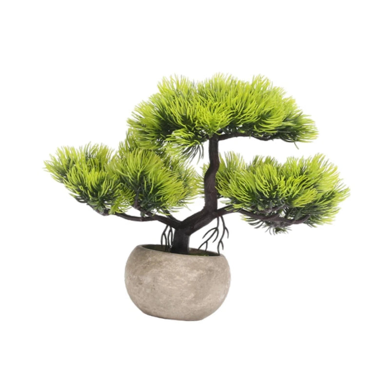 Small artificial bonsai tree with bright green foliage in round gray pot