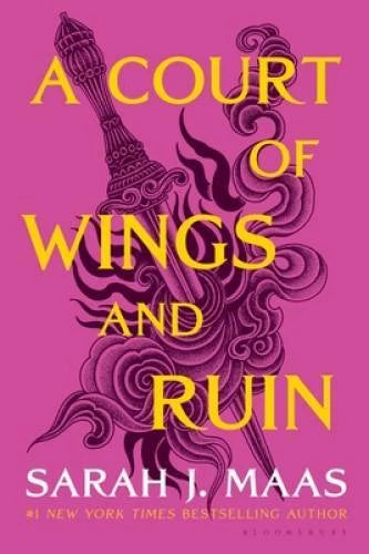 Paperback titled A Court of Wings and Ruin, with dark purple quill and ornament