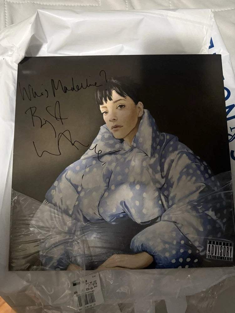 Signed vinyl record sleeve with portrait of woman in blue floral dress, Madeline Lyric