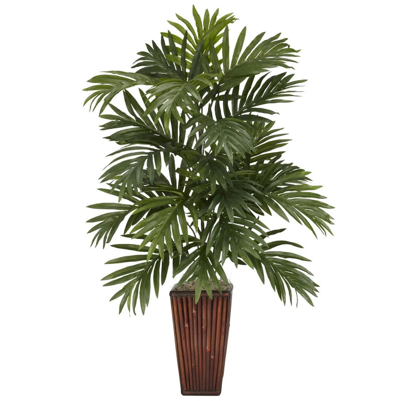 Areca palm silk plant with green leaves in bamboo vase