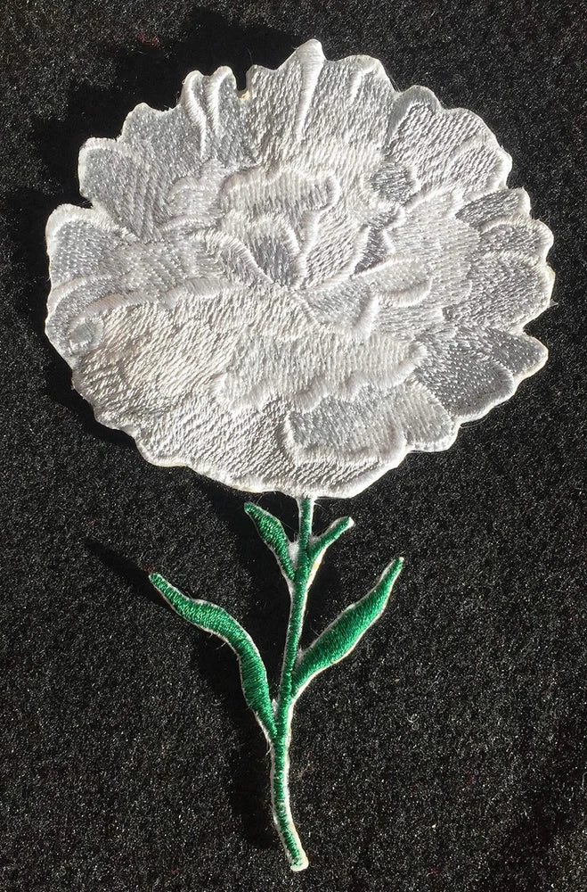 Embroidered white carnation flower with green stem and leaves