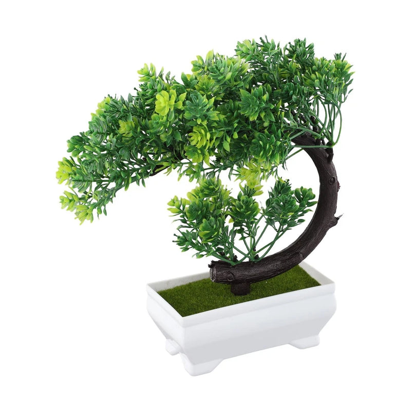 Artificial bonsai plant with green leafy canopy on dark curved trunk in white rectangular pot