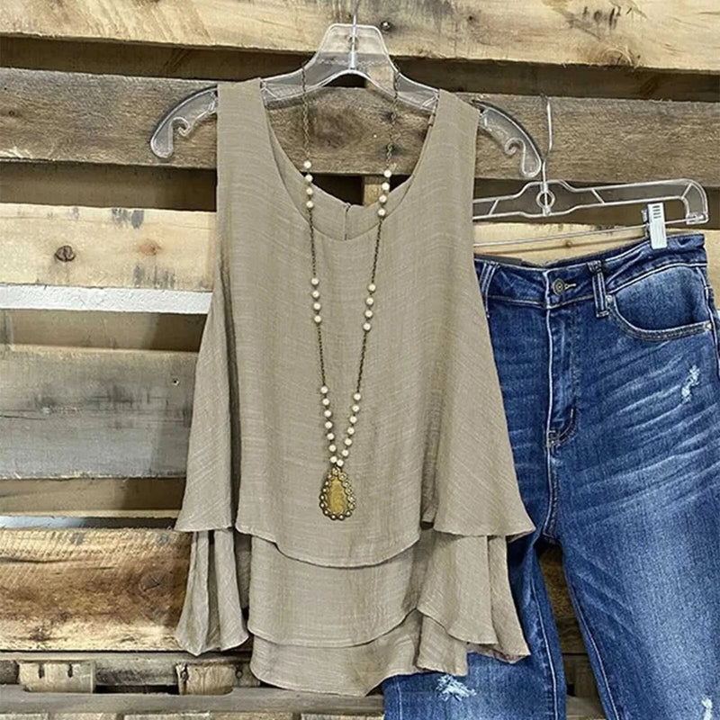 Light beige ruffle layered sleeveless tank top with draped tiers and loose fit