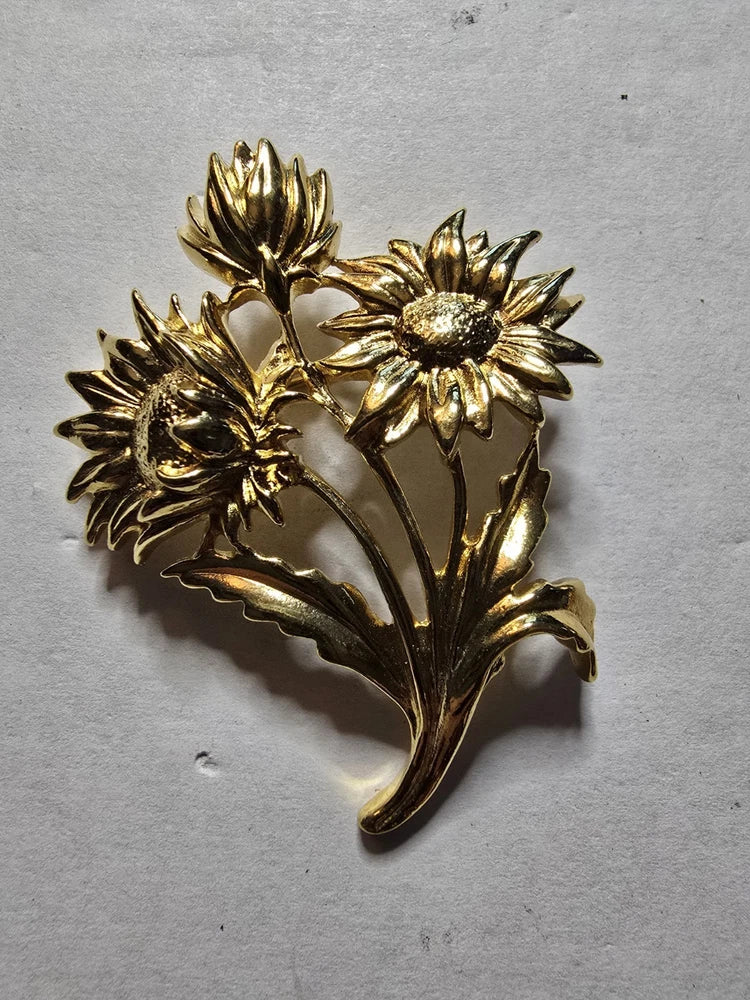 Polished gold-tone dimensional sunflower trio brooch pin with textured petals