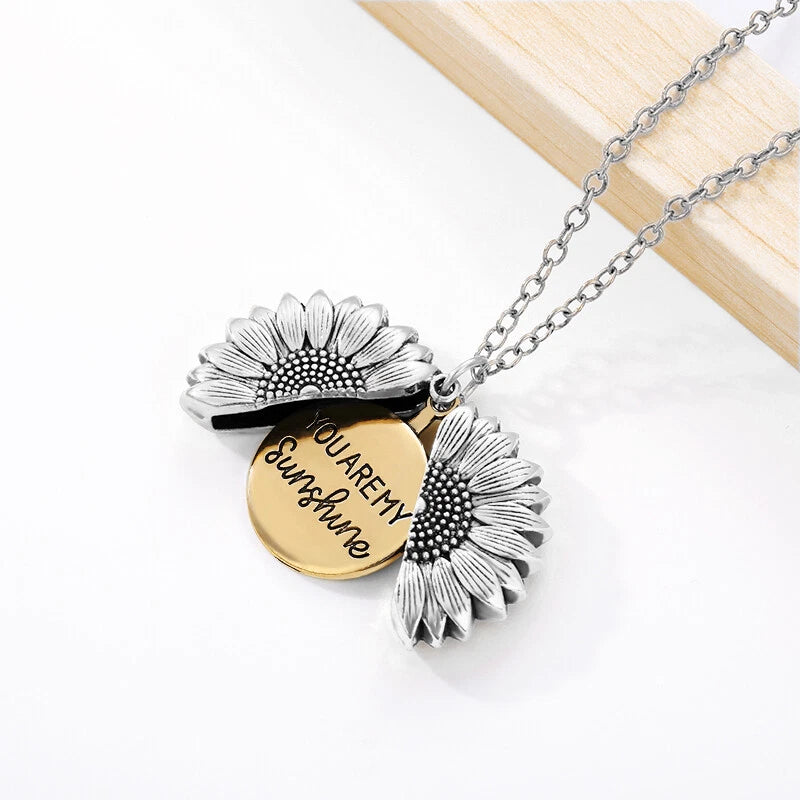 Silver-tone sunflower locket pendant necklace with engraved message and link chain