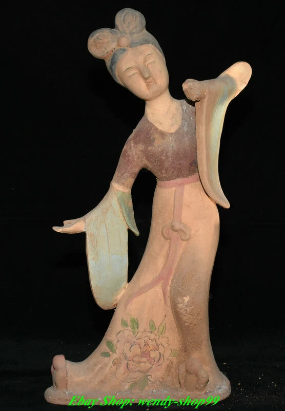 Tan ceramic palace beauty figurine with pink skirt, raised arms, peony floral details