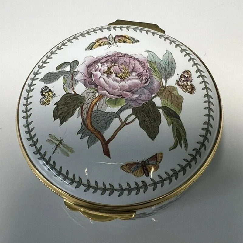 Round floral trinket box with painted peony, butterflies, and gold hinged lid rim