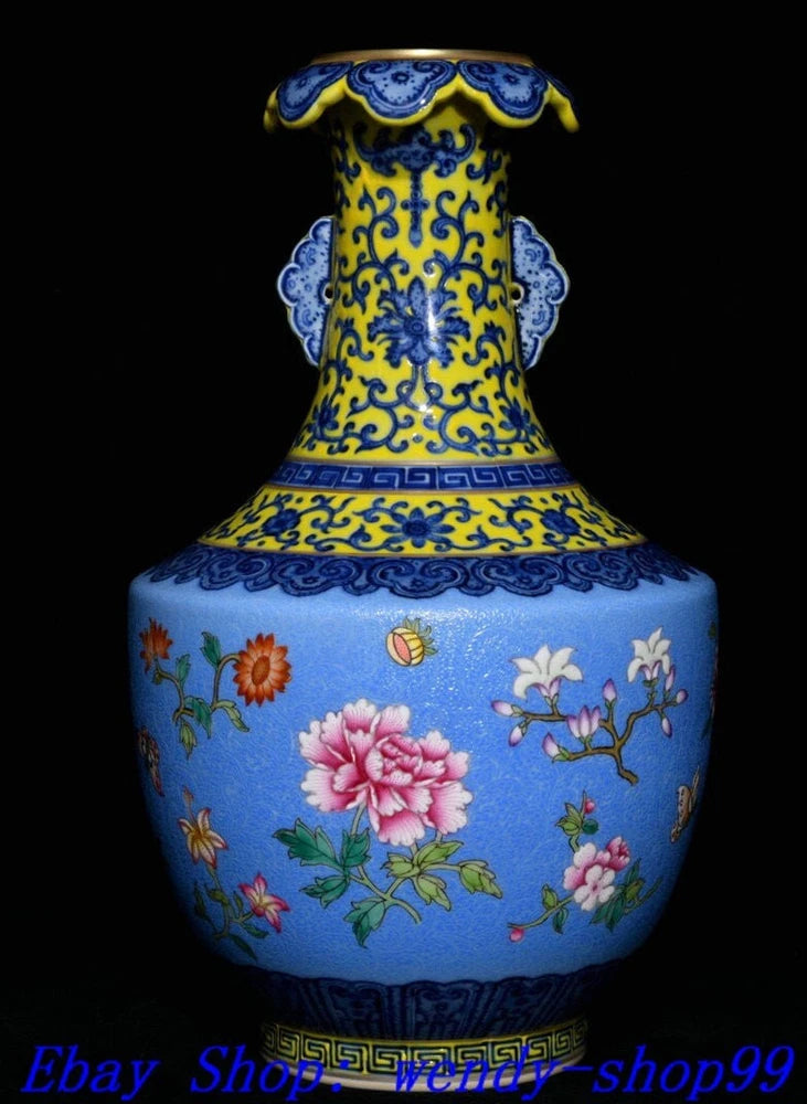 Blue porcelain bottle vase with peony and floral medallion design, ornate painted rim