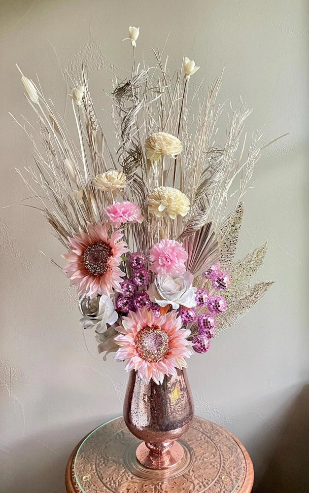 Pink and white sunflower centerpiece in decorative vase, sparkly stems and pink accents