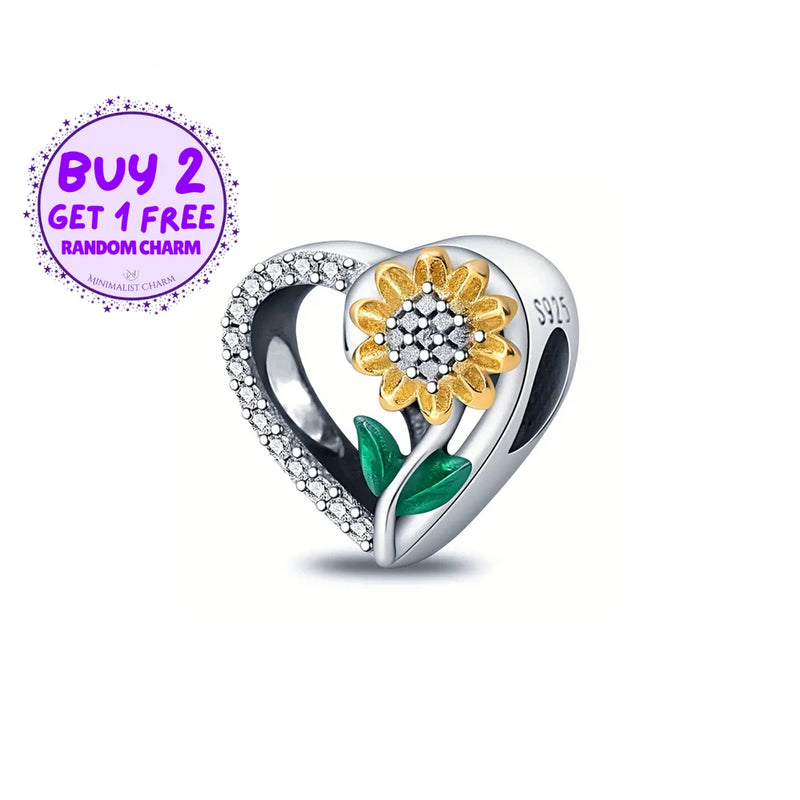 Heart-shaped sunflower charm: gold flower, green leaves, silver rhinestone frame