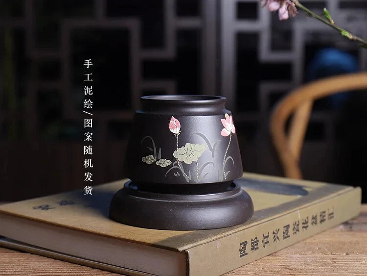 Gray-blue ceramic plant pot with hand-painted pink blossoms and leaves